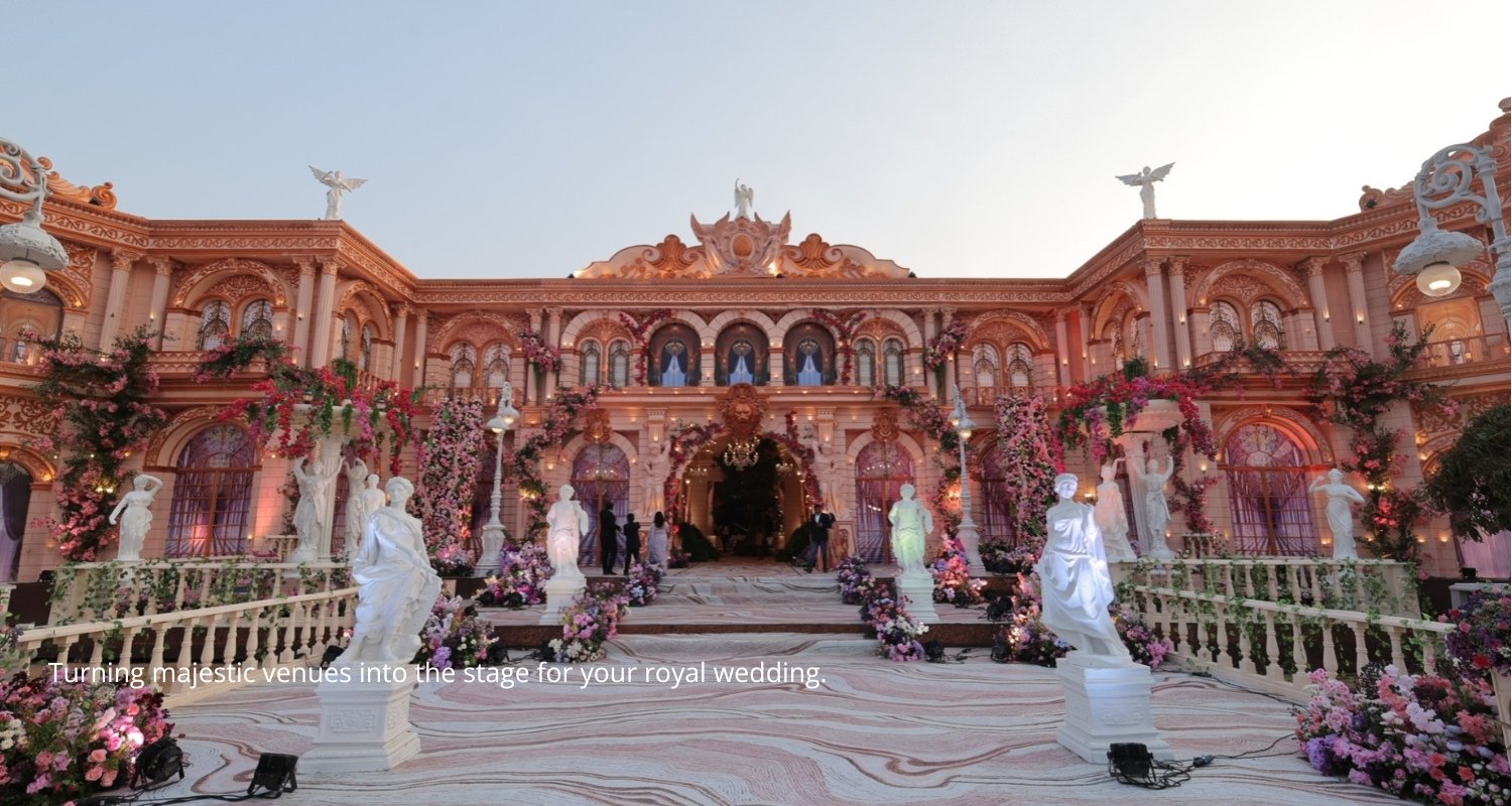 Elegant wedding setup with floral decorations and seating, white chairs and pastel flowers on tables, soft natural lighting, decorated aisle view